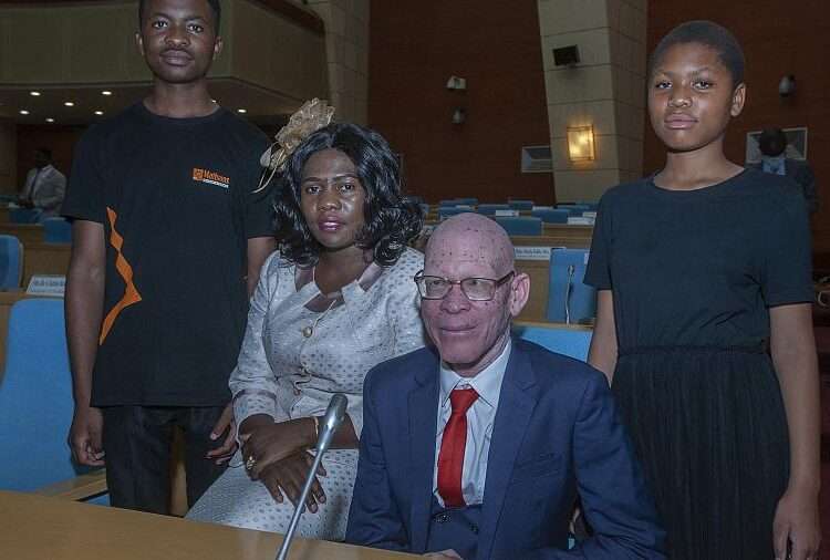 An albino activist was sworn into Malawi's parliament, a first in a country where people with albinism have suffered discrimination and killings.