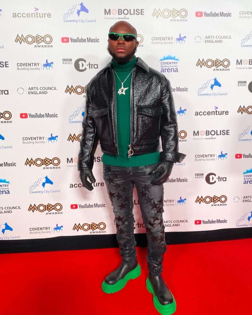 King Promise Stuns on MOBO Awards Red Carpet With Sneakers that Cost ...