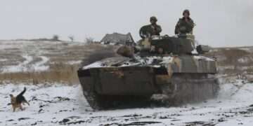 Ukrainian soldiers are facing some 100,000 Russian soldiers massed on their borders