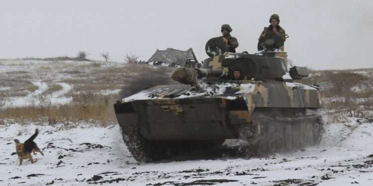 Ukrainian soldiers are facing some 100,000 Russian soldiers massed on their borders