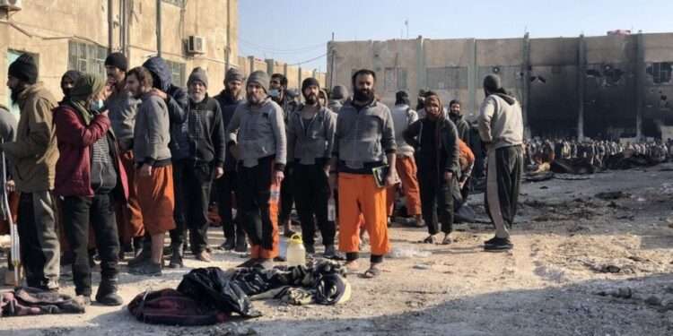 An SDF spokesman posted a photo he said showed IS militants surrendering inside Ghwayran prison