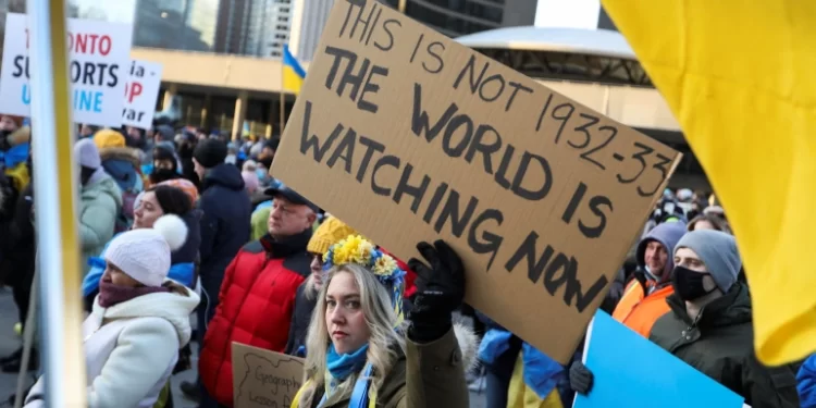 Ukrainian supporters rally in Toronto, Canada, after Russia launches massive military operation against Ukraine [Nick Lachance/Reuters]