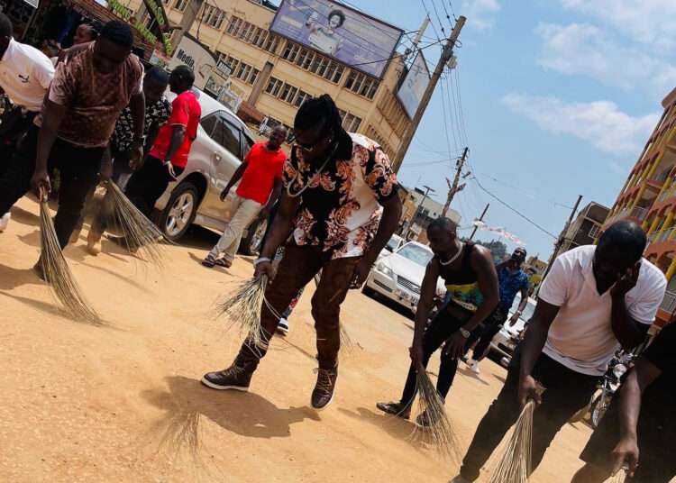 Ugandan Singer, Pallaso forced to sweep streets After Showing up Late for a Concert