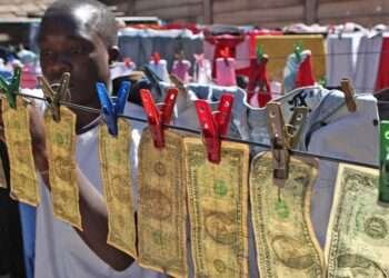 Monies held with pegs on a drying line.