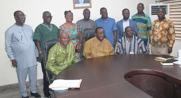 Grains board ..........Dr Owusu Afriyie Akoto seated middlewith the board members. Photo Godwin Ofosu Acheampong