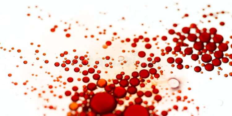 Blockchain Technology to Support Deforestation-Free Palm Oil Piloted- Unilever, SAP 1 floating red oil drops water surface abstract close up 60391324