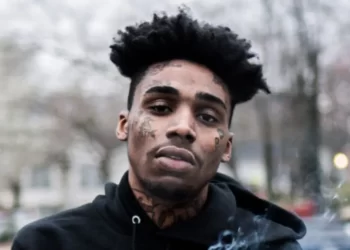 Goonew's 'embalmed body' Propped up in Nightclub? A bizarre footage circulating online appears to show mourners 'raving' alongside deceased rapper, Goonew's embalmed body at his funeral.