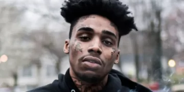 Goonew's 'embalmed body' Propped up in Nightclub? A bizarre footage circulating online appears to show mourners 'raving' alongside deceased rapper, Goonew's embalmed body at his funeral.