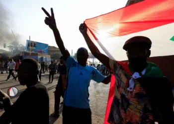 Protesters march in Khartoum North, Sudan April 6, 2022. © Mohamed Nureldin Abdallah, Reuters