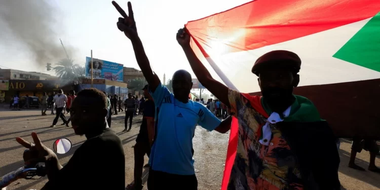 Protester killed in Sudan Rally Three Years After Anti-Bashir Uprising 1 Protesters march in Khartoum North, Sudan April 6, 2022. © Mohamed Nureldin Abdallah, Reuters