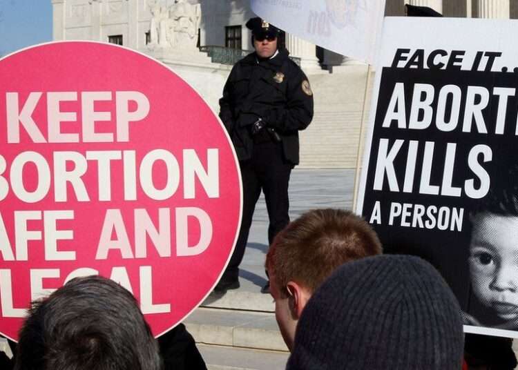 Placards speaking to abortion rights