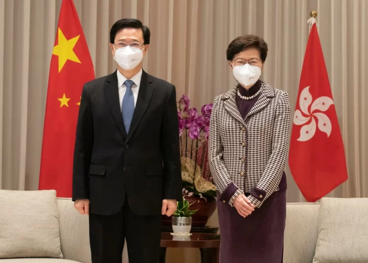 Hong Kong Chief Executive-elect John Lee (L) will take over from Carrie Lam on July 1