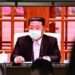 North Korean leader Kim Jong Un appeared in a face mask on television for the first time on Thursday to order nationwide lockdowns