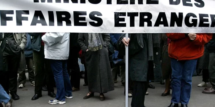 French foreign ministry civil servants demonstrate in Paris in 2003 [File: Philippe Wojazer/Reuters]
