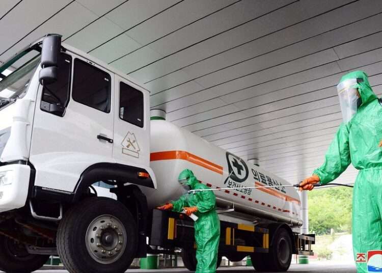 North Korea: Fighting Covid With Traditional Medicine 1 A worker disinfects a vehicle carrying medical oxygen, in Pyongyang