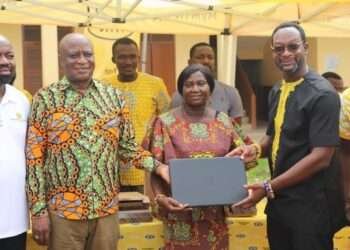 MTN Ghana Resumes Ashantifest With More Exciting And Life Enriching Activities 1 CEO-MTN-Selorm-Adadevoh (2nd-Left)
presents Laptops to Officials of Asokwa MA Basic School as part of the 2022 Ashantifest Yello Care Digital caravan