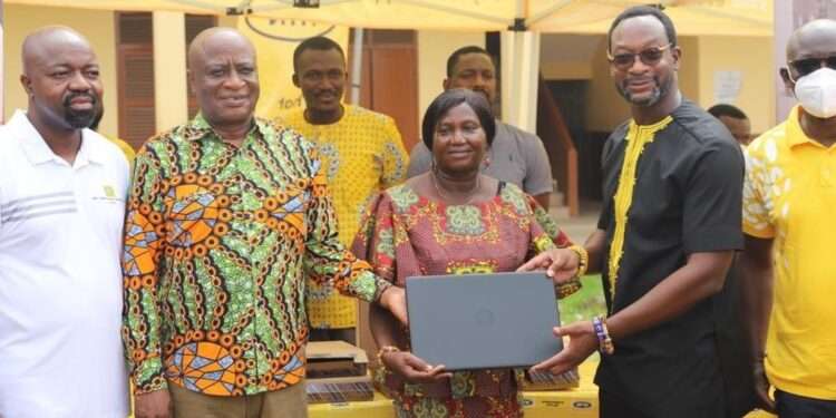 MTN Ghana Resumes Ashantifest With More Exciting And Life Enriching Activities 1 CEO-MTN-Selorm-Adadevoh (2nd-Left)
presents Laptops to Officials of Asokwa MA Basic School as part of the 2022 Ashantifest Yello Care Digital caravan