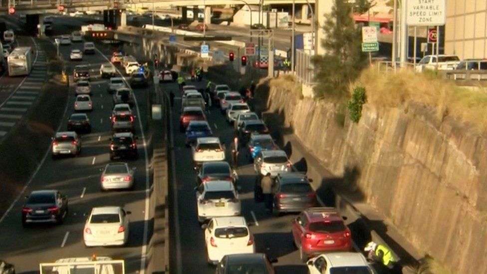 Sydney Climate Protests: Activists Block Streets and Harbour Tunnel 2 Traffic banked up ahead of the Sydney Harbour Tunnel on Monday