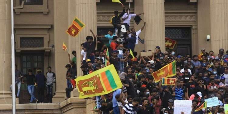 Protesters made their way into the house, chanting slogans and waving the national flag