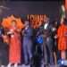 Mrs Agyire Tettey leading the team to receive the award