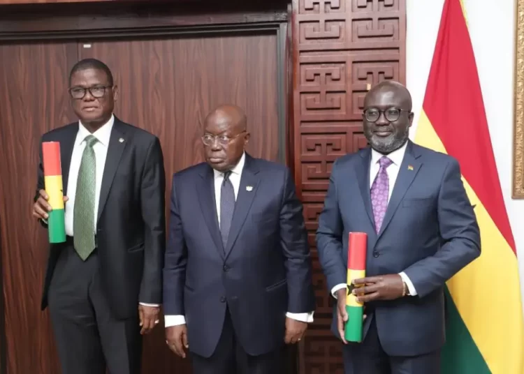 <strong>President Swears In Two New Envoys</strong> 1 President swears in two new convoys.
