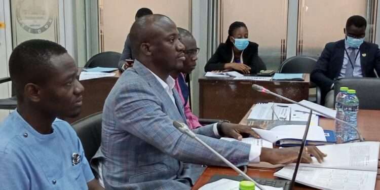 Dr. Abdul Nasir Alfa Mohammed, Vice Chair -PIAC answering questions at ad hoc committee sitting