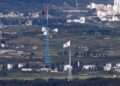 North Korea Warns Of New Deterrent Over US-South Korea Drills 6 Flags of North Korea, rear, and South Korea, front, flutter in the wind as pictured from the border area between two Koreas in Paju, South Korea, on Aug. 9, 2021.
