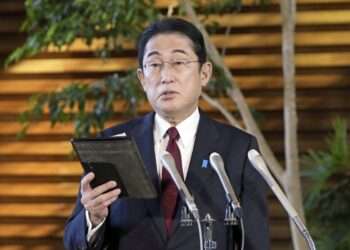 Japanese Prime Minister Fumio Kishida speaks before the media at his official residence in Tokyo, Tuesday, Dec. 27, 2022, after Kenya Akiba, minister in charge of reconstruction of Fukushima and other disaster-hit areas, submitted his resignation.