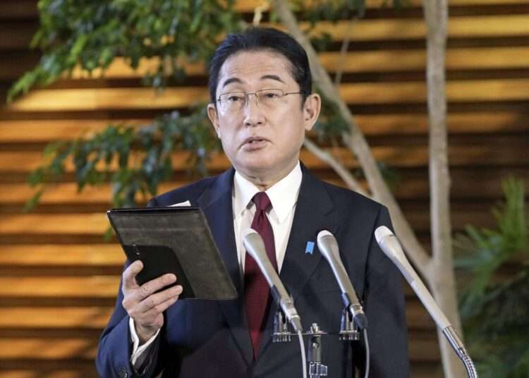 Japanese Prime Minister Fumio Kishida speaks before the media at his official residence in Tokyo, Tuesday, Dec. 27, 2022, after Kenya Akiba, minister in charge of reconstruction of Fukushima and other disaster-hit areas, submitted his resignation.