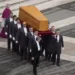 The coffin of late Pope Emeritus Benedict XVI is brought to St. Peter's Square for a funeral mass at the Vatican, Thursday, Jan. 5, 2023