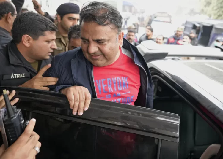 <strong>Pakistan: Senior Leader Of Imran Khan’s Party Arrested</strong> 1 Fawad Chaudhry, center, a senior leader of former Prime Minister Imran Khan's party, leaves after his medial checkup at a hospital in Lahore, Pakistan, Wednesday, Jan. 25, 2023.