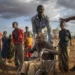 Displaced people who have arrived at a camp wait for plot allocation on the outskirts of Dollow, Somalia.