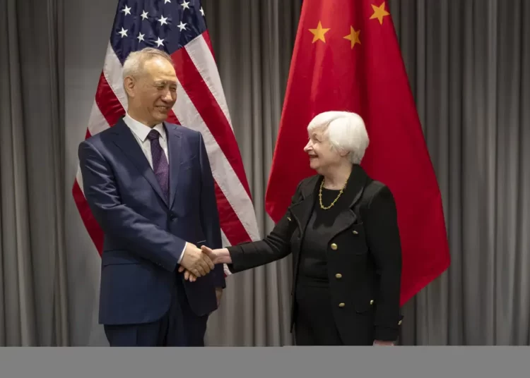 Treasury Secretary Janet Yellen, right, shakes hands with China's Vice-Premier Liu He during a bilateral meeting in Zurich, Switzerland