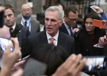 Rep. Kevin McCarthy, R-Calif., talks to reporters as he leaves the House floor after the House voted to adjourn for the evening as the House met for a third day to try and elect a speaker and convene the 118th Congress on Capitol Hill in Washington.