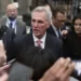 Rep. Kevin McCarthy, R-Calif., talks to reporters as he leaves the House floor after the House voted to adjourn for the evening as the House met for a third day to try and elect a speaker and convene the 118th Congress on Capitol Hill in Washington.