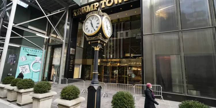 <strong>Court Fines Trump Organization $1.6 Million For Tax Fraud</strong> 1 Pedestrians pass security barricades in front of Trump Tower, Wednesday, Feb. 17, 2021, in New York