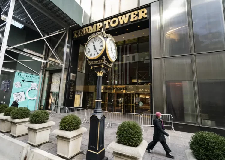 <strong>Court Fines Trump Organization $1.6 Million For Tax Fraud</strong> 1 Pedestrians pass security barricades in front of Trump Tower, Wednesday, Feb. 17, 2021, in New York