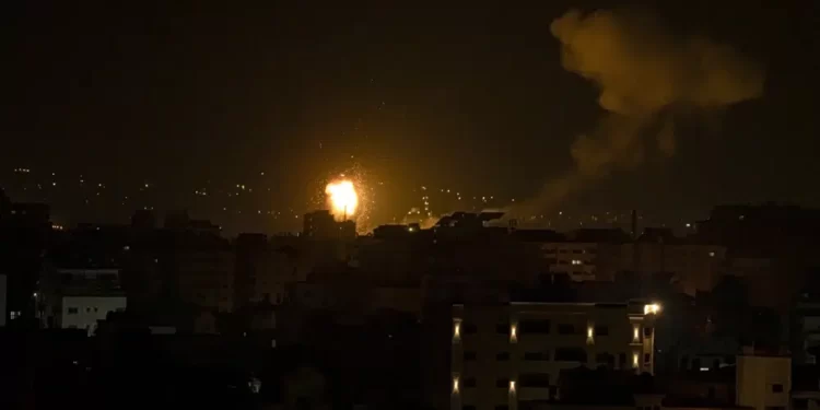 Fire and smoke rises following an Israeli airstrike in central Gaza Strip, Friday, Jan. 27, 2023.