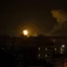 Fire and smoke rises following an Israeli airstrike in central Gaza Strip, Friday, Jan. 27, 2023.