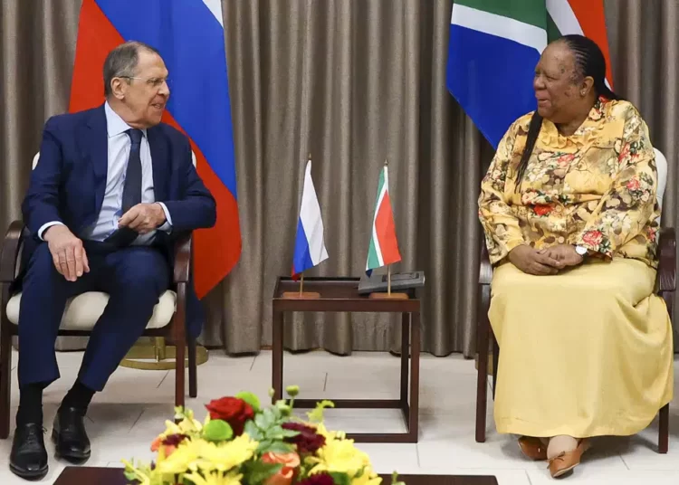 Russia's Foreign Minister Sergey Lavrov, left, and his South Africa's counterpart Naledi Pandor, speak, during their meeting in Pretoria, South Africa, Monday, Jan. 23, 2023.