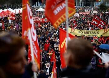 Protesters demonstrate against the French government's proposed pension reforms in Saint-Nazaire on France's west coast, as part of a day of nationwide strikes on January 19, 2023
