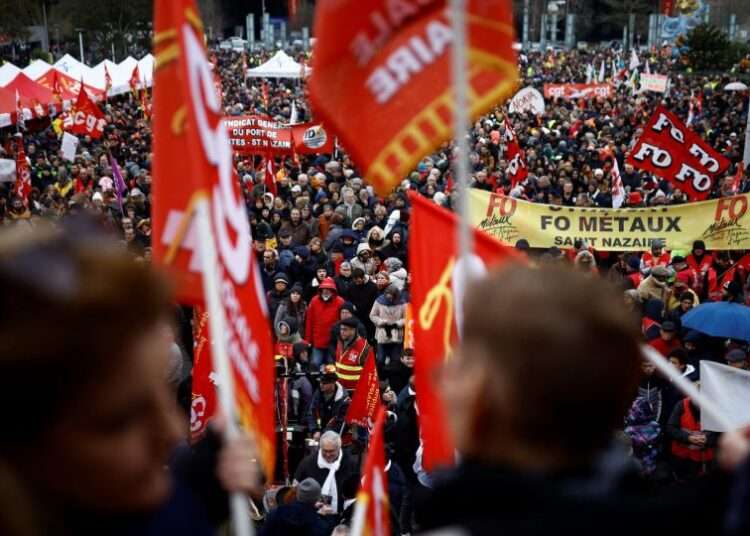 <strong>France: Workers Protest Against Raise In Retirement Age</strong> 1 Protesters demonstrate against the French government's proposed pension reforms in Saint-Nazaire on France's west coast, as part of a day of nationwide strikes on January 19, 2023