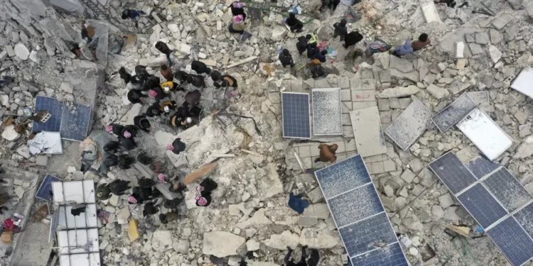 <strong>Turkey Earthquake: Death Toll Rises To More Than 2300</strong> 1 Civil defense workers and residents search through the rubble of collapsed buildings in the town of Harem near the Turkish border, Idlib province, Syria, Monday, Feb. 6, 2023.