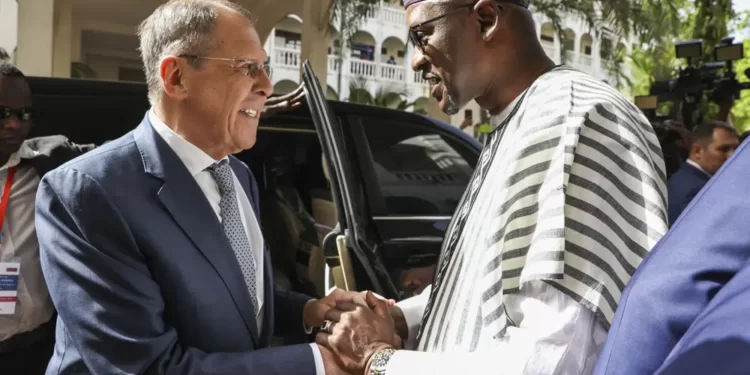 Russia Pledges Military Support To Mali 1 Mali's Foreign Minister Abdoulaye Diop, right, welcomes Russia's Foreign Minister Sergey Lavrov during their meeting in Bamako, Mali, Tuesday, Feb. 7, 2023.