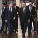 U.S. Secretary of State Antony Blinken, left, and Turkish Foreign Minister Mevlut Cavusoglu arrive for their meeting in Ankara, Turkey, Monday, Feb. 20, 2023.