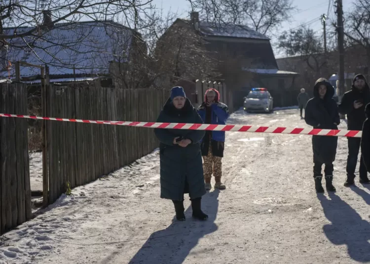 <strong>Russia Bombards Targets Across Ukraine</strong> 1 Residents wait behind police cordon to return to their homes after a rocket attack in Kyiv suburbs, Ukraine, Friday, Feb. 10, 2023.