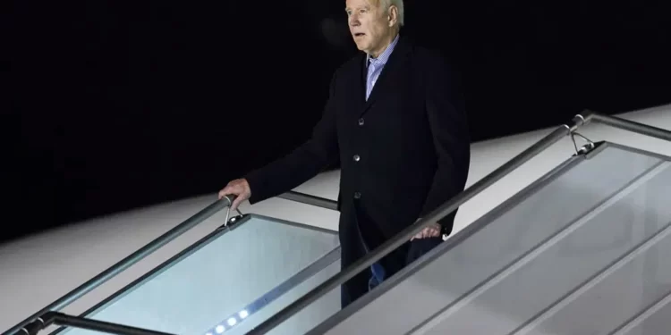 President Joe Biden arrives at a military airport in Warsaw, Poland, Monday, Feb. 20, 2023