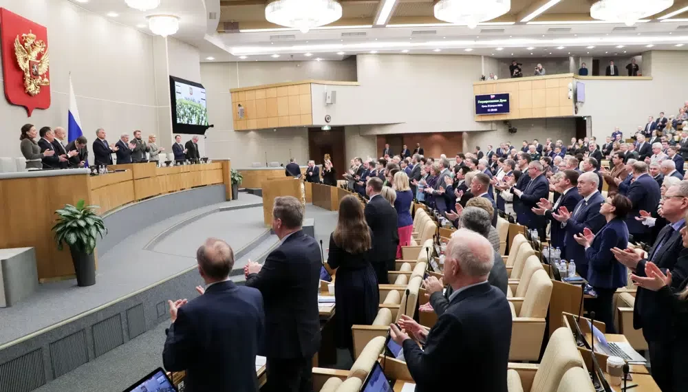 In this handout photo released by The State Duma, The Federal Assembly of The Russian Federation, Russian lawmakers attend a session at the State Duma, the Lower House of the Russian Parliament in Moscow, Russia, Wednesday, Feb. 22, 2023.