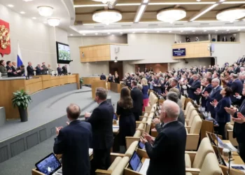 In this handout photo released by The State Duma, The Federal Assembly of The Russian Federation, Russian lawmakers attend a session at the State Duma, the Lower House of the Russian Parliament in Moscow, Russia, Wednesday, Feb. 22, 2023.