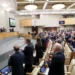 In this handout photo released by The State Duma, The Federal Assembly of The Russian Federation, Russian lawmakers attend a session at the State Duma, the Lower House of the Russian Parliament in Moscow, Russia, Wednesday, Feb. 22, 2023.